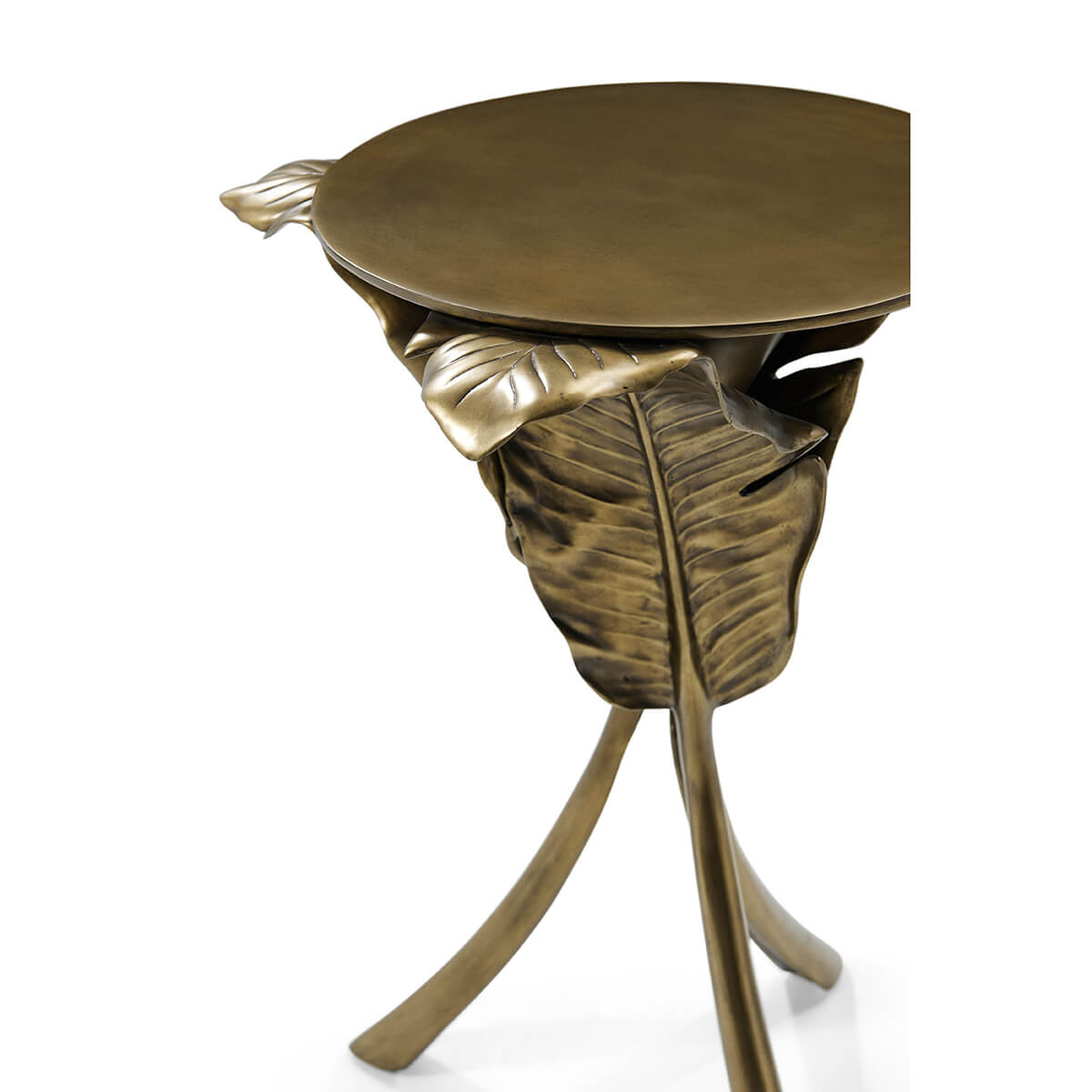 Close-up of Gold Palmetto table, detailed leaf craftsmanship.