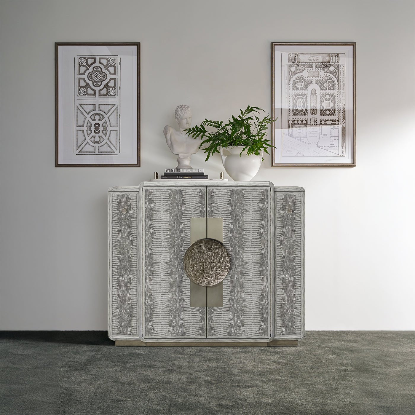 Gray bar cabinet styled with decor in living room.