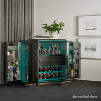 Bar cabinet open, displaying liquor bottles and glasses.