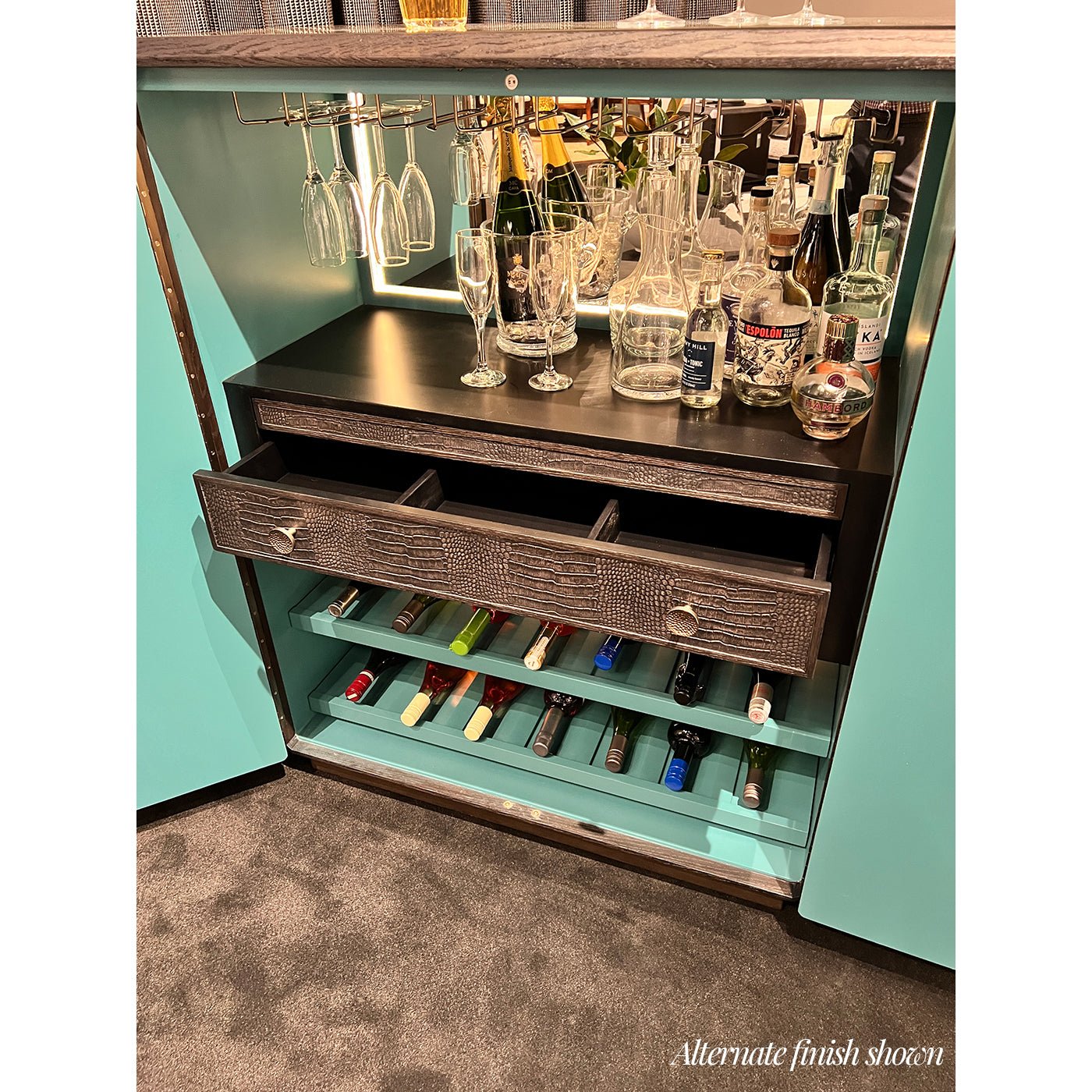 Open bar cabinet, drawer detail with alternate finish inside.