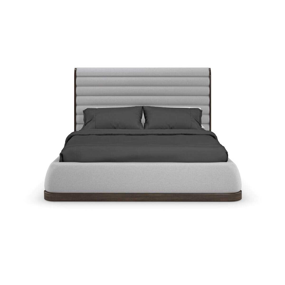 Front view of gray channeled king bed with pillows.