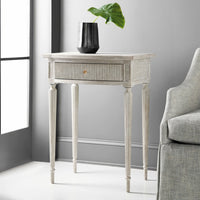 Styled gray Gustavian side table in modern interior.