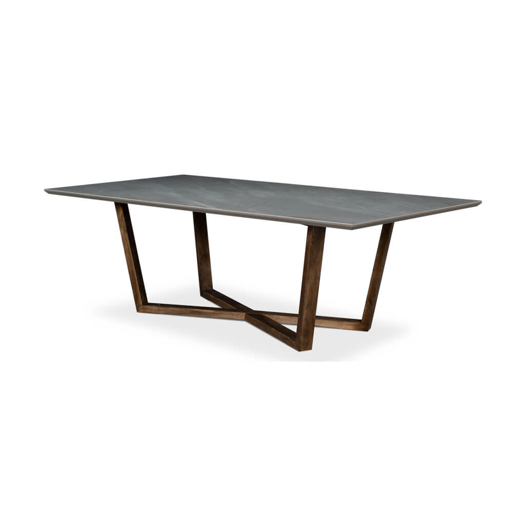 Side angle of gray porcelain dining table, wooden legs.