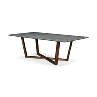 Side angle of gray porcelain dining table, wooden legs.