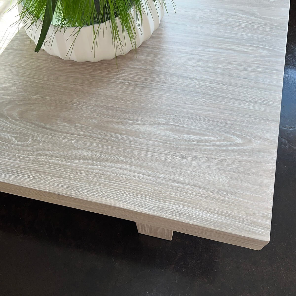 Texture detail of geometric coffee table, wood finish