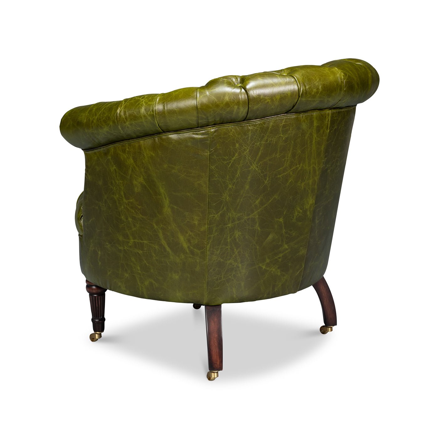 Green leather barrel back chair, back angled view.