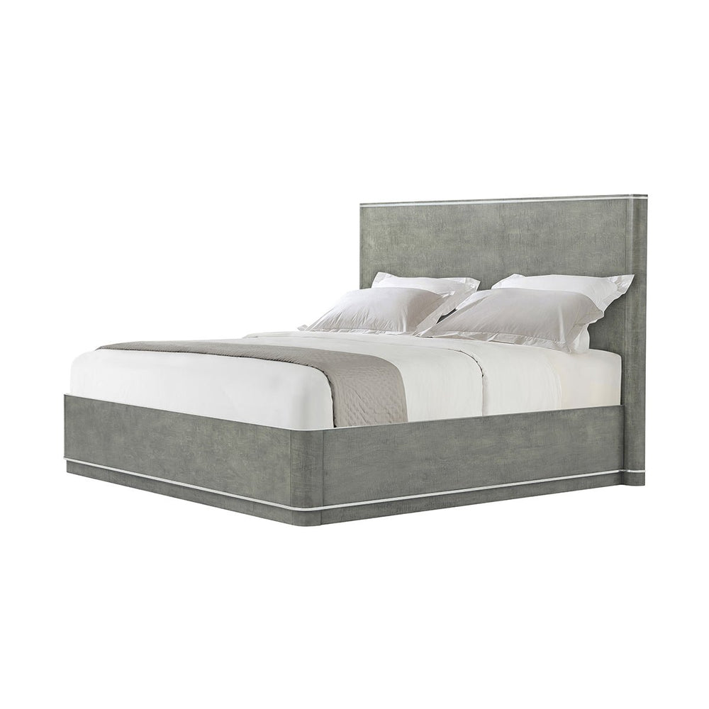 Grey Art Deco bed frame angled view with bedding.