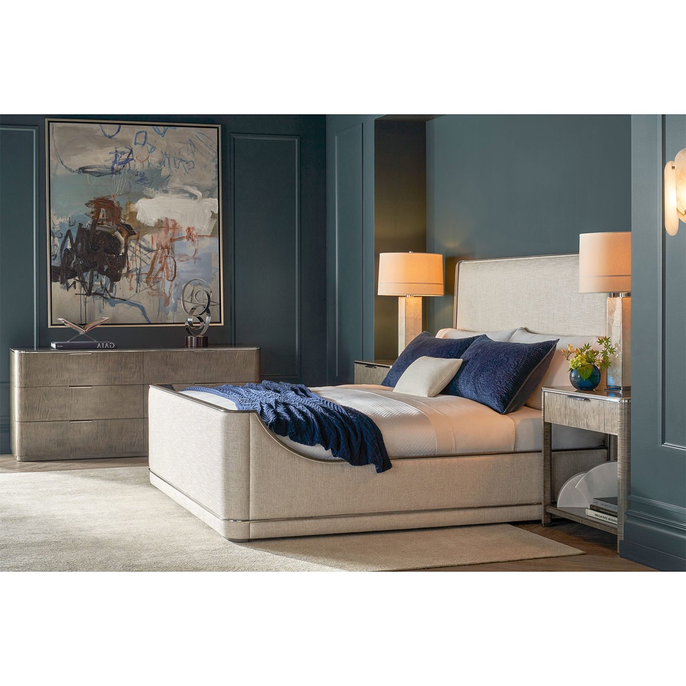 Bedroom setup with art deco nightstand and decor.
