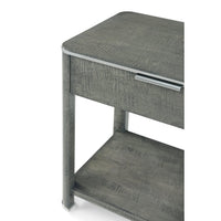 Close-up of nightstand's corner and drawer handle detail.