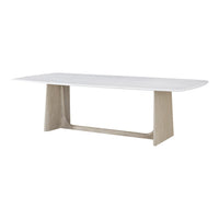 Angled view modern quartz top dining table, grey oak base.