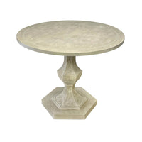 Grey round center table, front angle perspective.