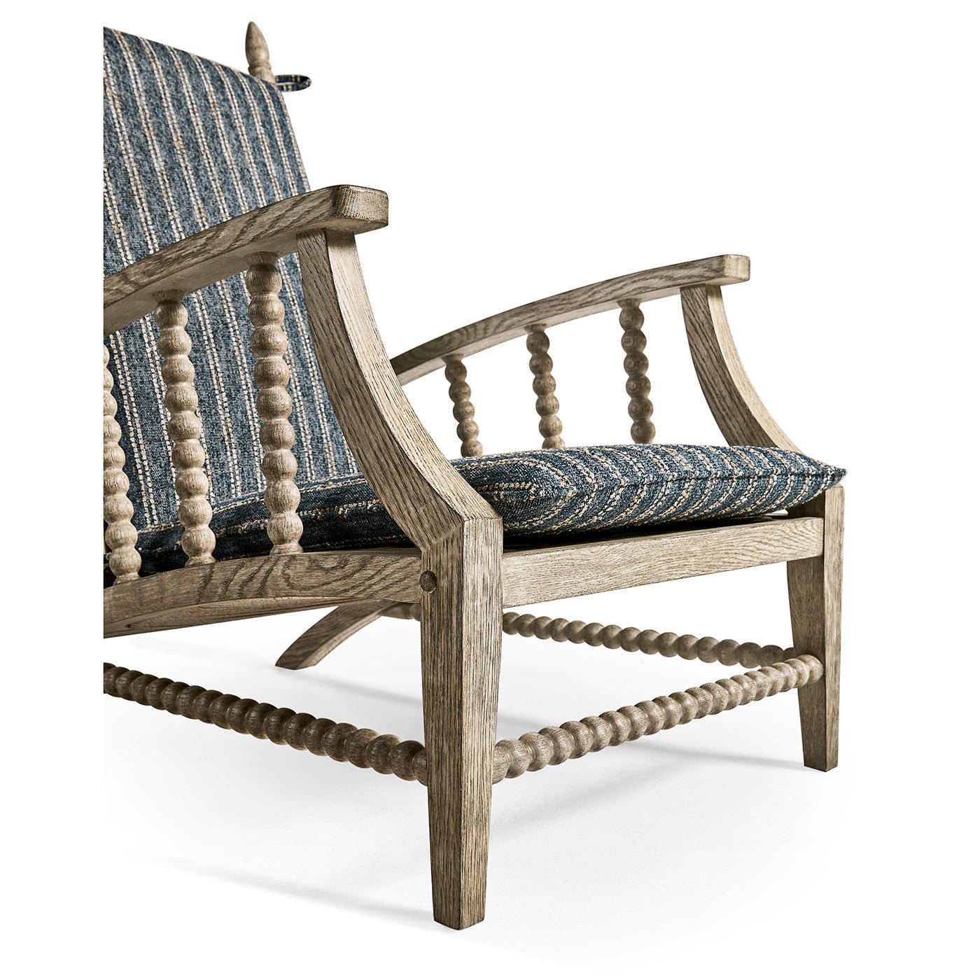 Lounge chair arm design, spindle and cushion detail.