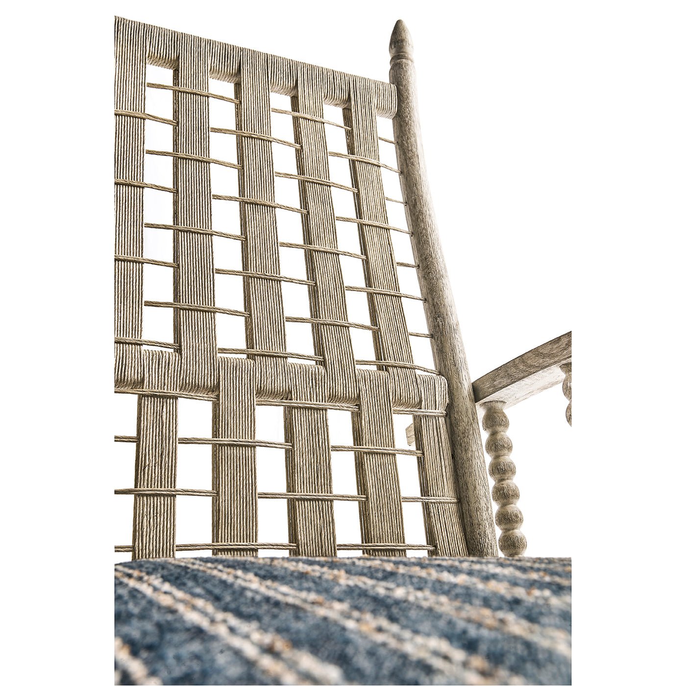 Woven back, artistic perspective of lounge chair.