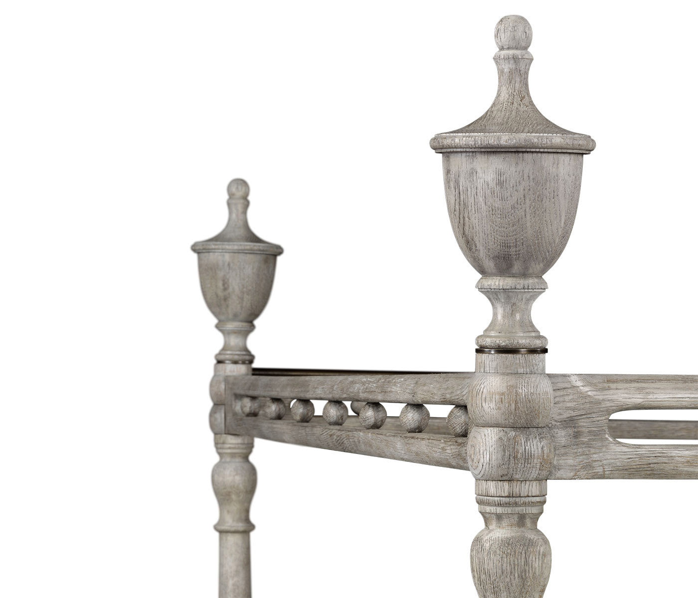 Close-up of bed post detailing on greyed oak bed.