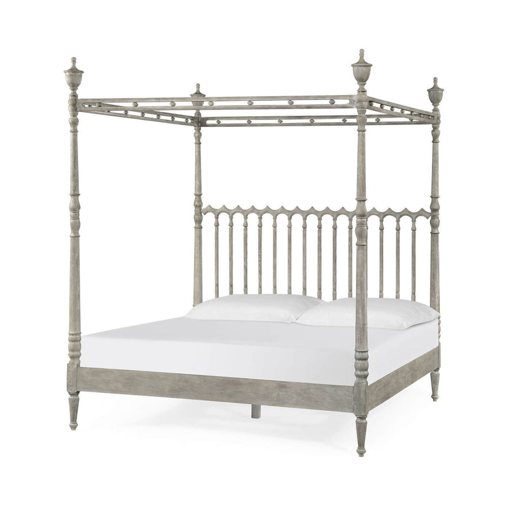Four-post greyed oak king bed, angled view.