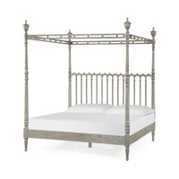 Four-post greyed oak king bed, angled view.