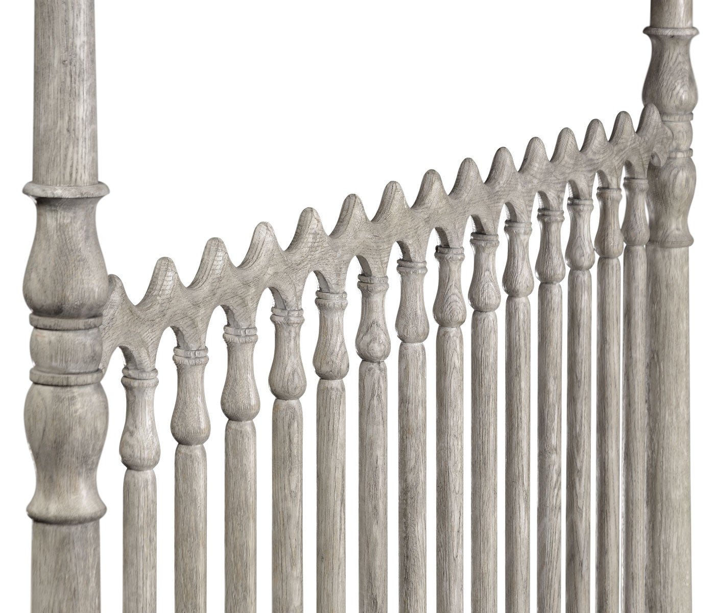 Headboard detailing of greyed oak four-post king bed.