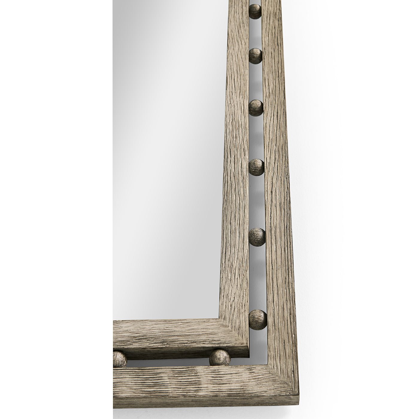 Close-up of corner detailing on greyed oak mirror
