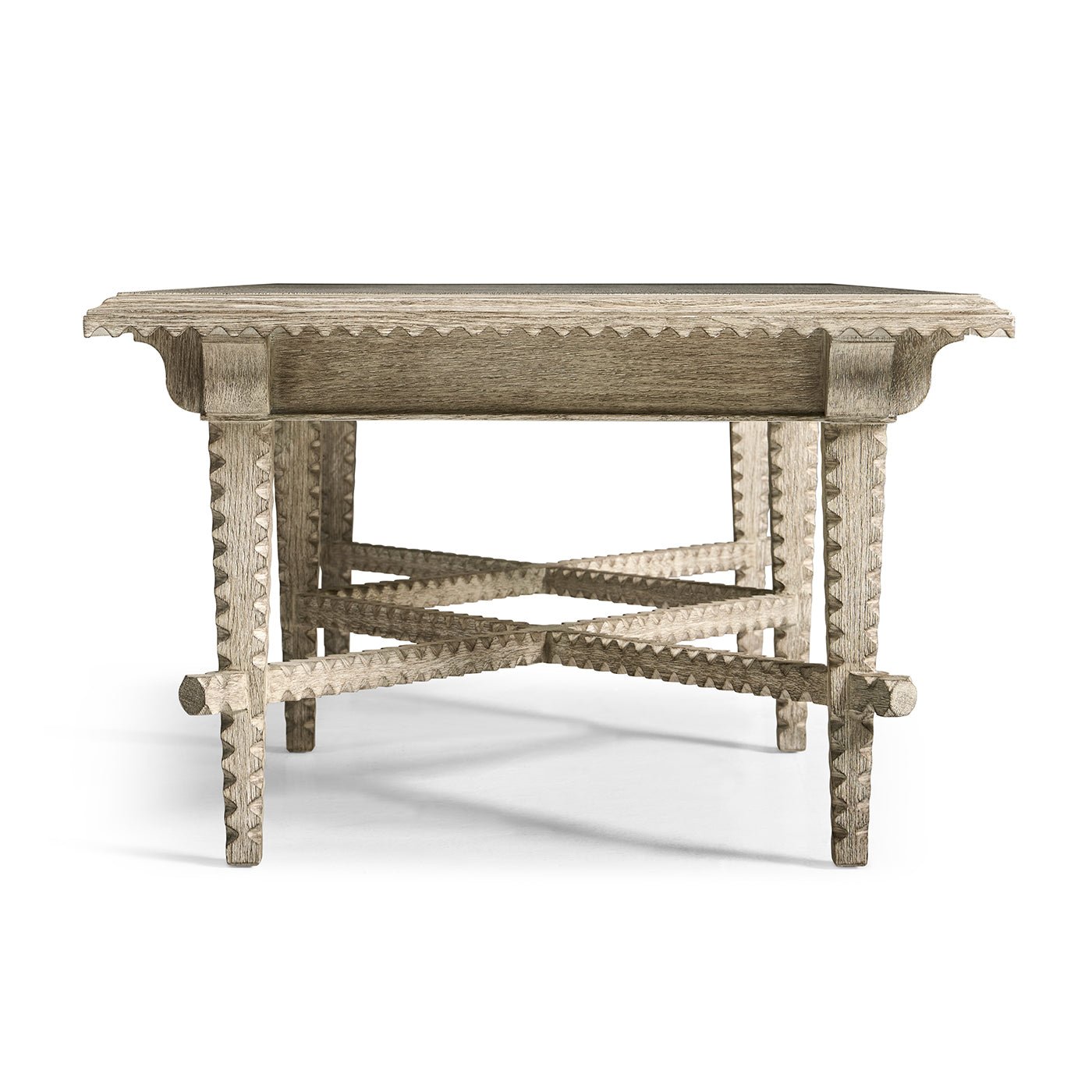 End view of rustic coffee table with ornate legs.