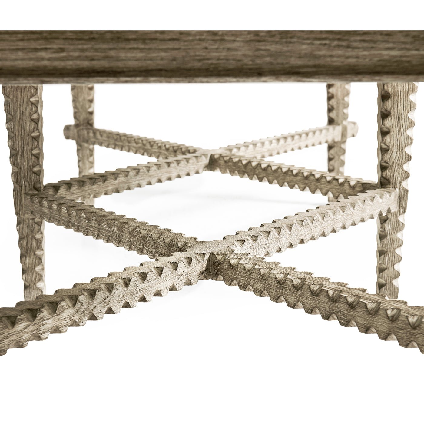 Close-up of rustic coffee table's intricate cross supports.