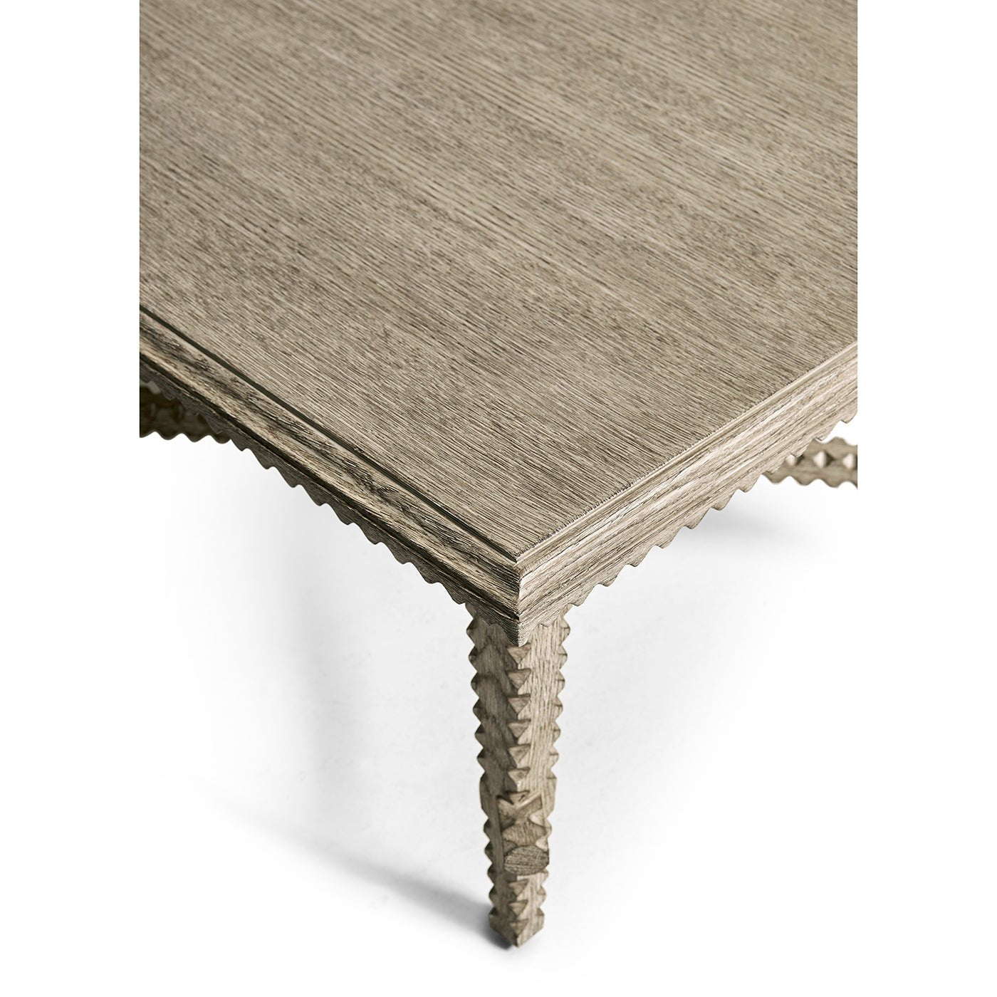 Close-up of coffee table corner and zigzag legs.