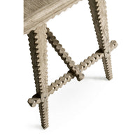 Leg and support detail of greyed oak rustic console table.