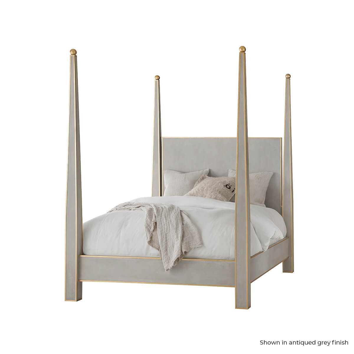 Grey four poster bed with neutral bedding, angled view.