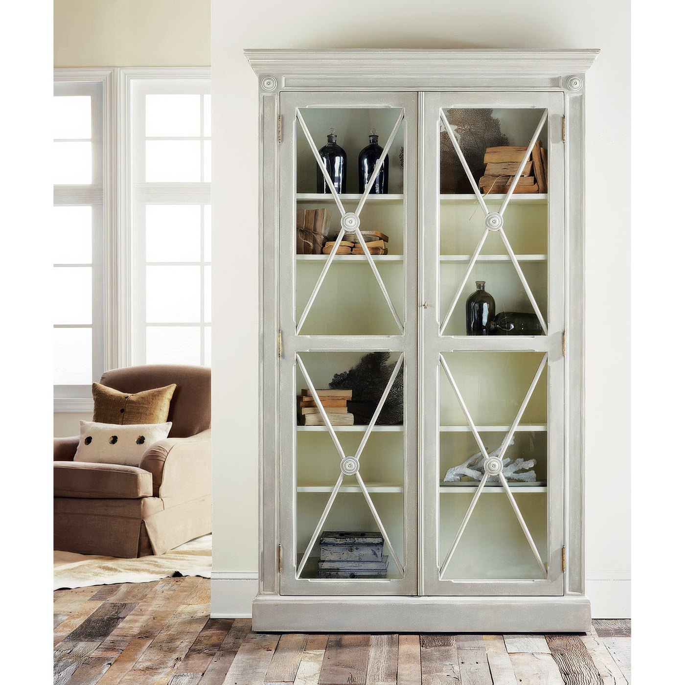 Gustavian display cabinet, styled with books and decor, living room.