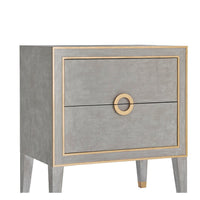 Front view of grey painted nightstand with gold accents.