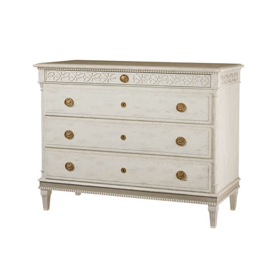 Gustavian style dresser with intricate carvings and drawers.