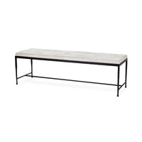 Angled view of the 60-inch Dusty Cream hair-on-hide bench with patchwork seat and slender black iron frame