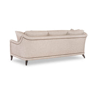 Beige modern sofa, back view highlighting smooth fabric.