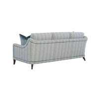 Blue patterned modern sofa, back view with sleek design.