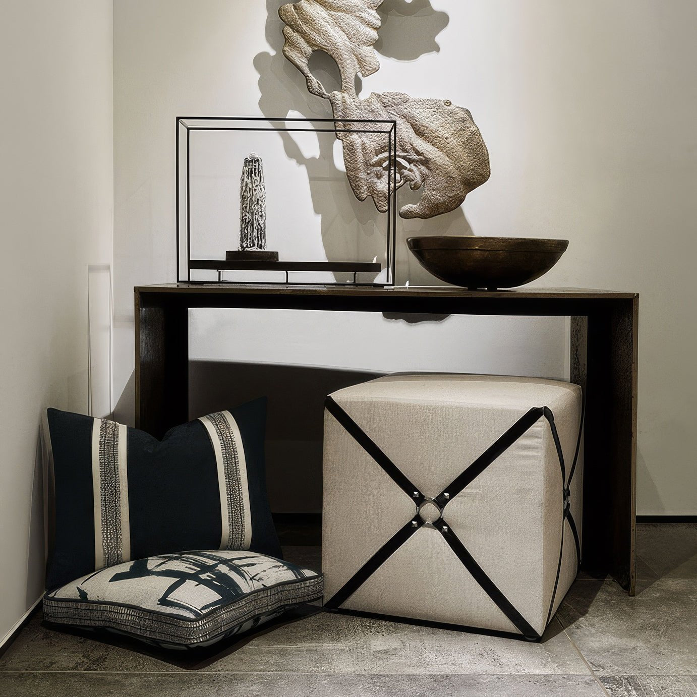 Harness cube ottoman in modern decor setup.