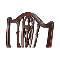 Detailed Hepplewhite armchair back design, intricate woodwork close-up.