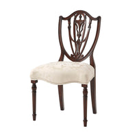 Hepplewhite shield back dining chair front view.