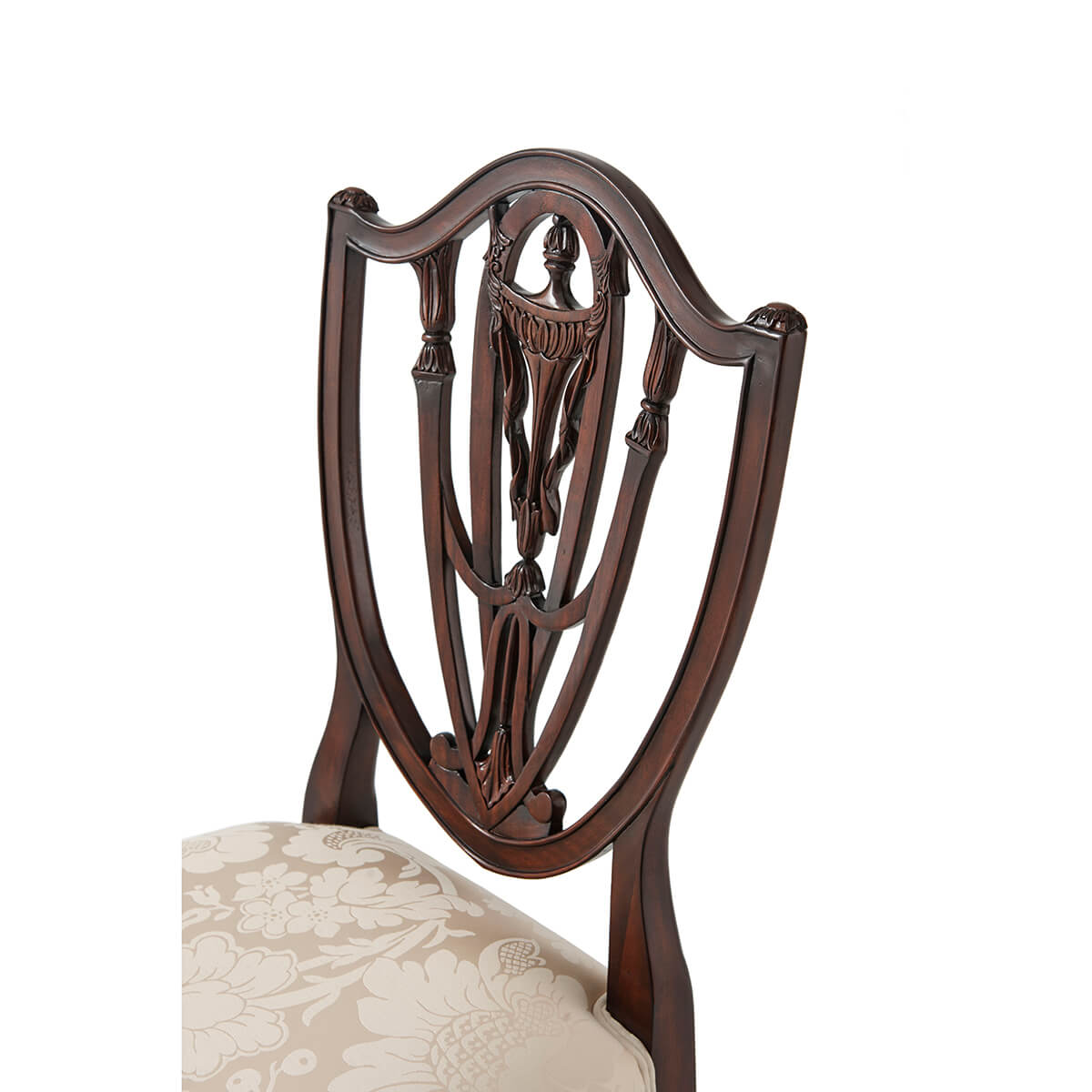 Hepplewhite shield back dining chair intricate backrest design.