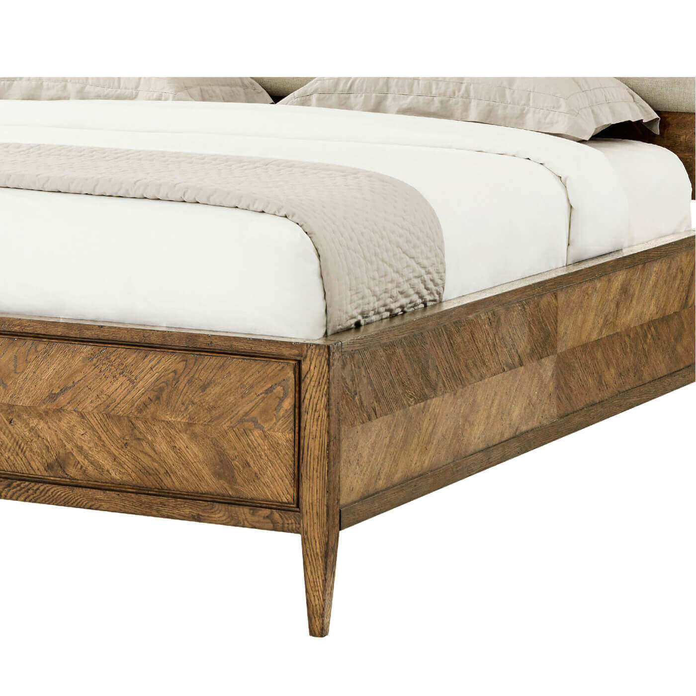 Light oak king bed, close-up of corner detail.