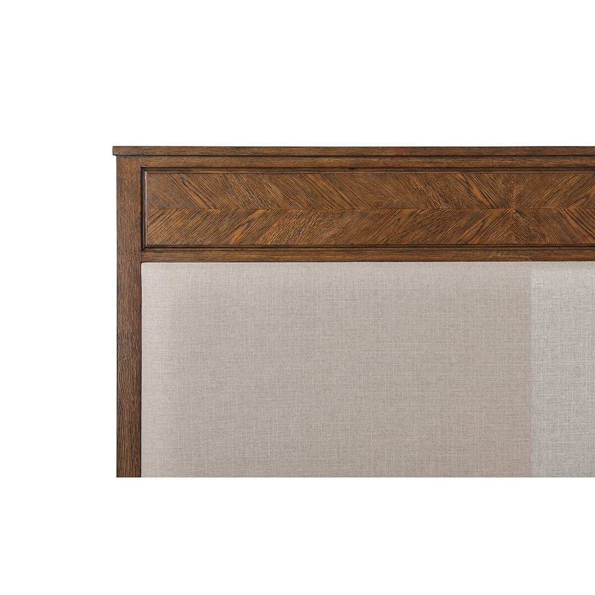 Wooden queen bed headboard close-up with fabric panel.