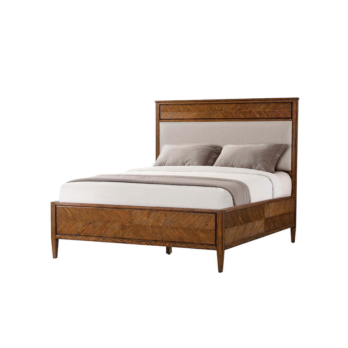 Wooden queen bed with pillows and bedding, side view.