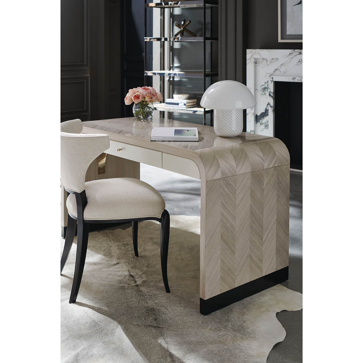 Herringbone desk in stylish room setting with chair.