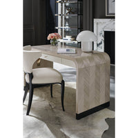 Herringbone desk in stylish room setting with chair.