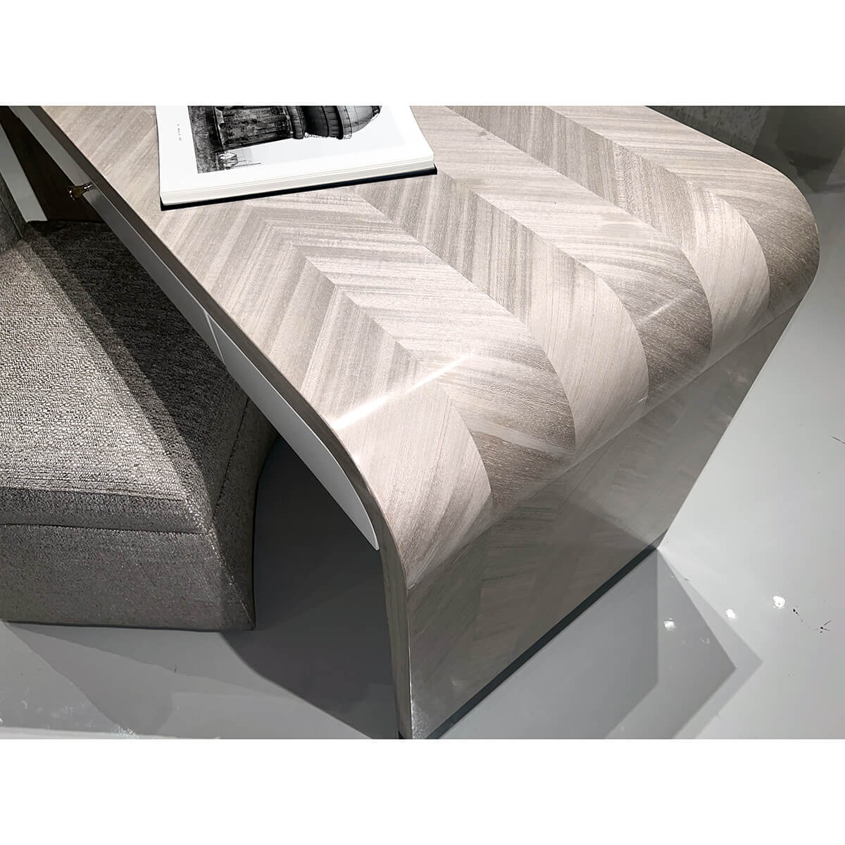 Close-up of Herringbone desk's herringbone design detail.