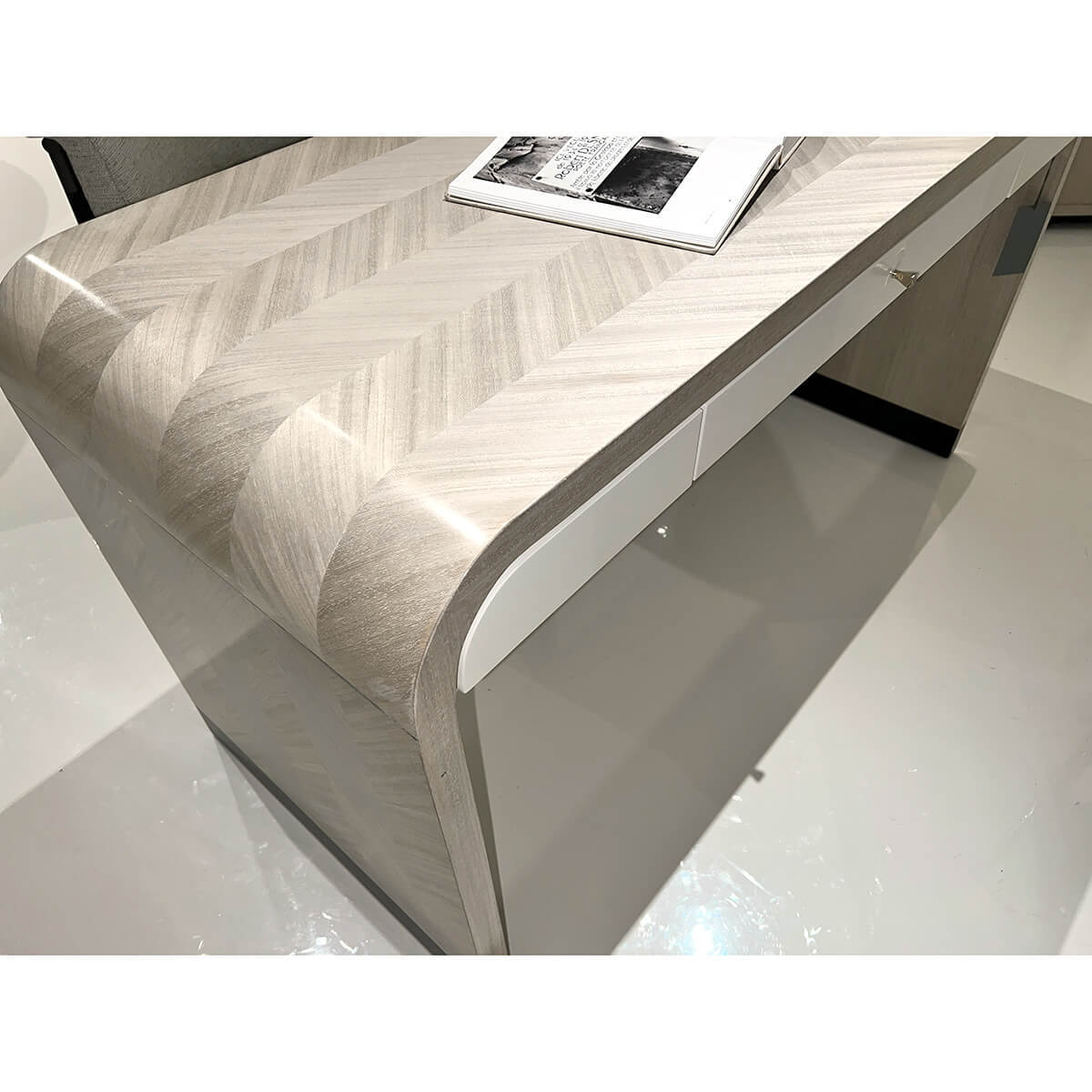 Angled view of Herringbone desk showcasing design and texture.