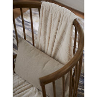 High back spindle armchair, close-up with blanket.