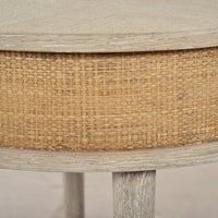 Close-up of woven texture on round side table.