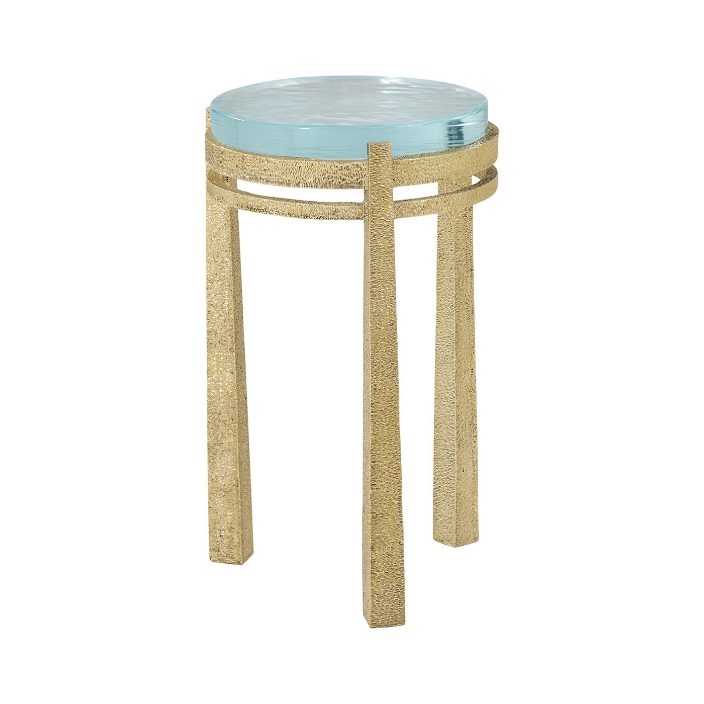 Gold accent table with glass top, artistic design.
