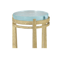 Close-up of gold accent table rim, textured finish.