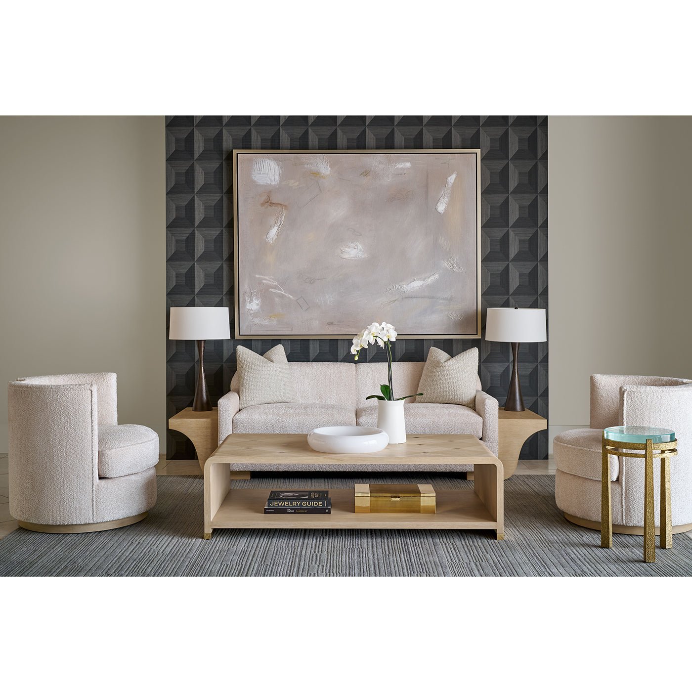 Living room with accent table, beige furniture, modern decor.