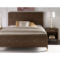 Bedside table in stylish bedroom with decorative lamps.